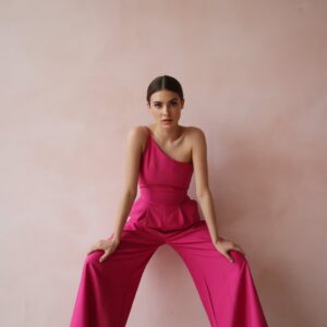 Lifestyle fashion photography in studio featuring modern outfits and luxury accessories