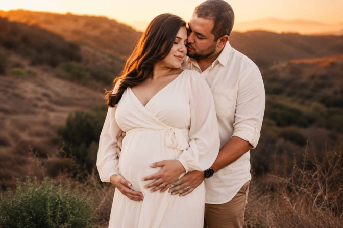 Couple maternity photoshoot with coordinated neutral outfits