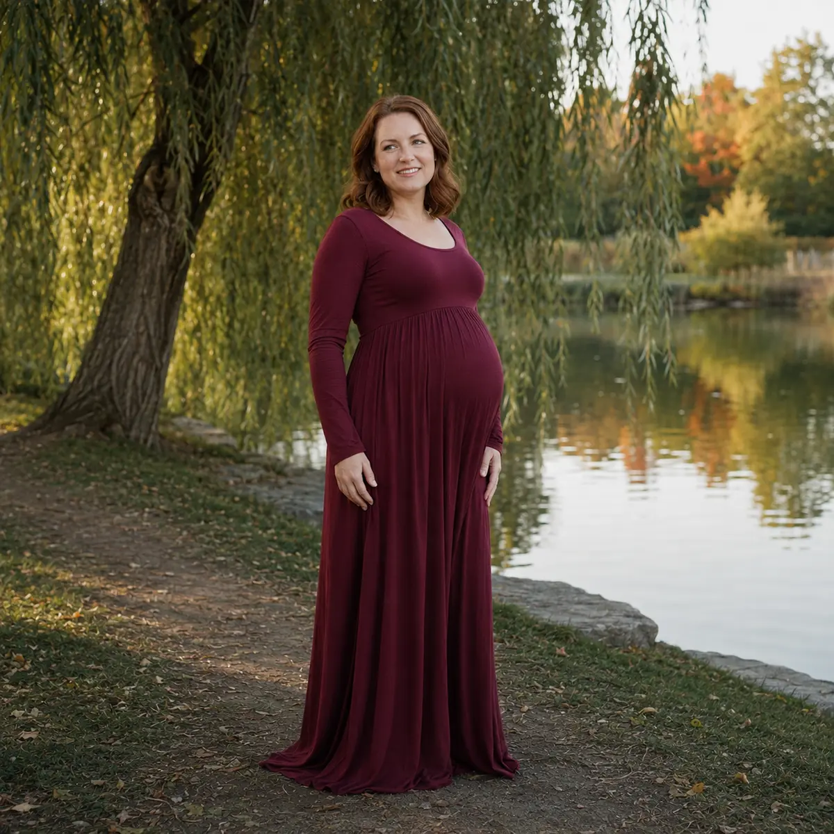 Autumn pregnancy portrait beside a pond in Stouffville