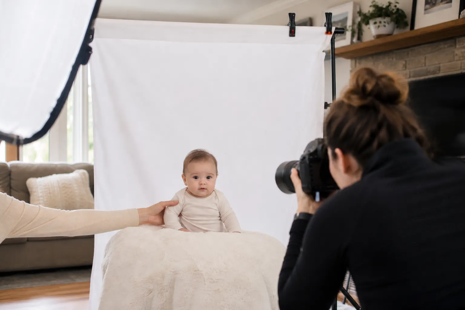 Behind-the-scenes baby passport photo session in a Toronto home