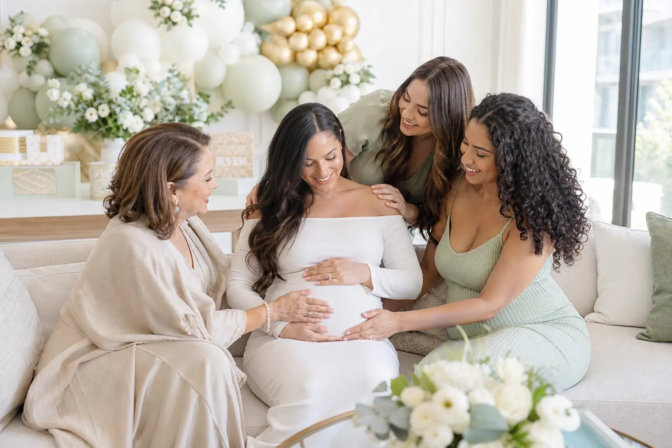 Baby shower photographer in Toronto capturing an expecting mother with family and friends
