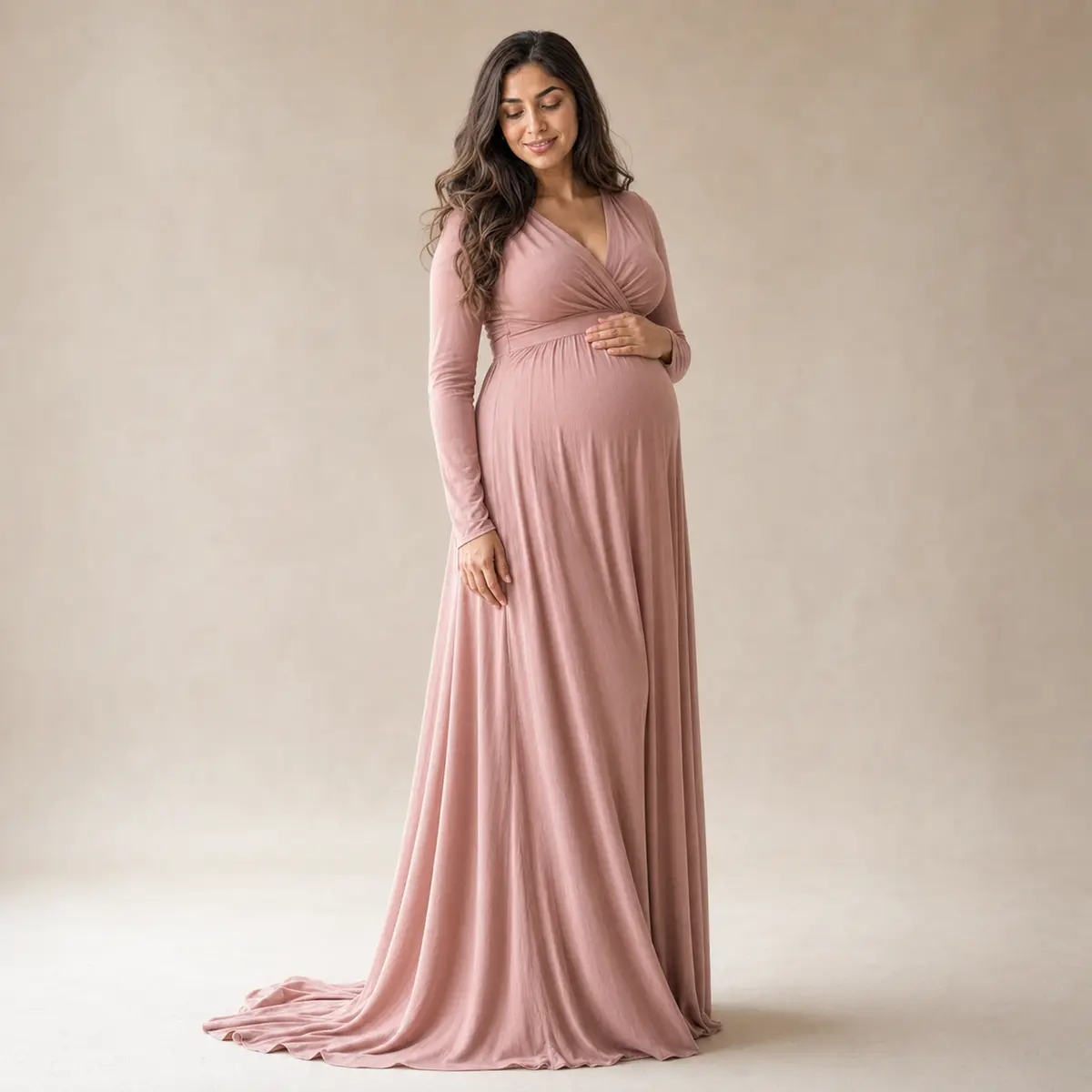 Studio pregnancy portrait in a dusty rose maternity gown