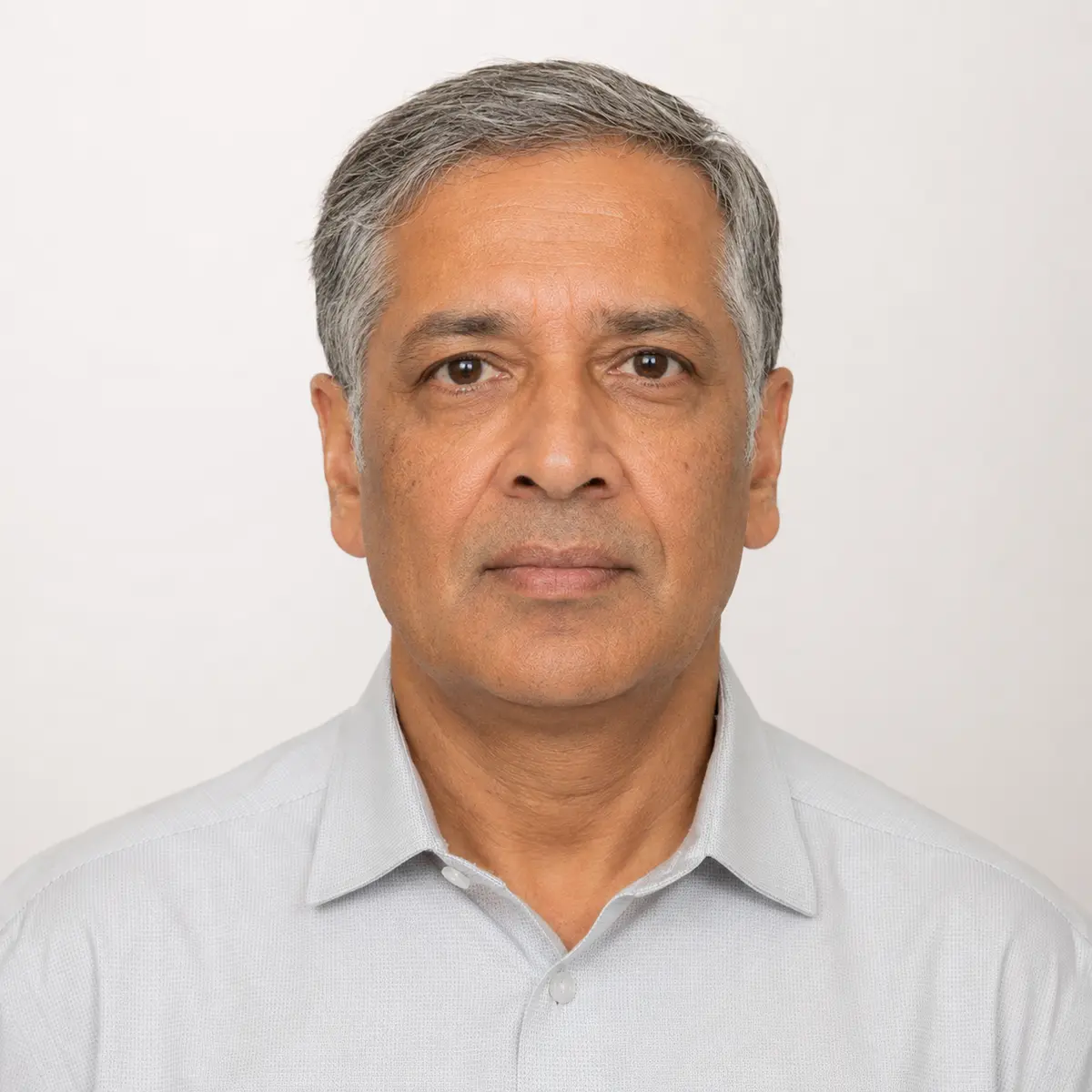 Professional passport photo of a senior man in Toronto