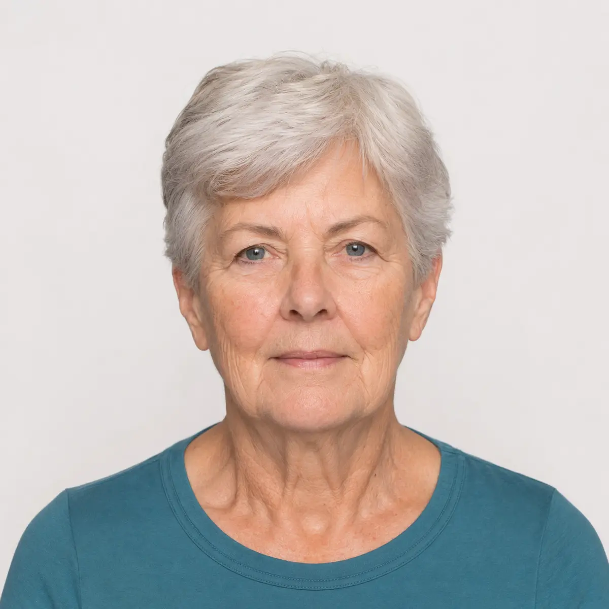 Professional passport photo of a senior woman in Toronto