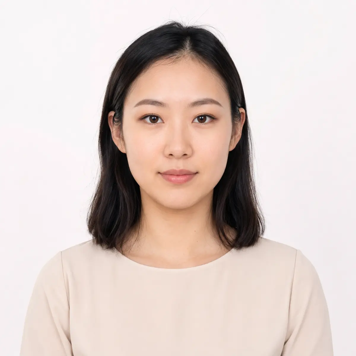 Professional passport photo of a young woman in Toronto