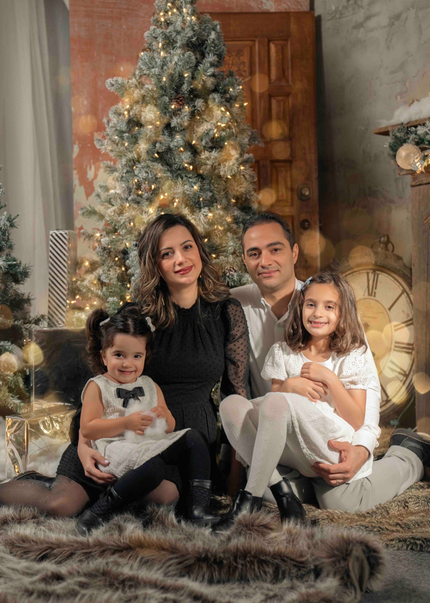 Parents and children posing for Christmas family photos in Toronto