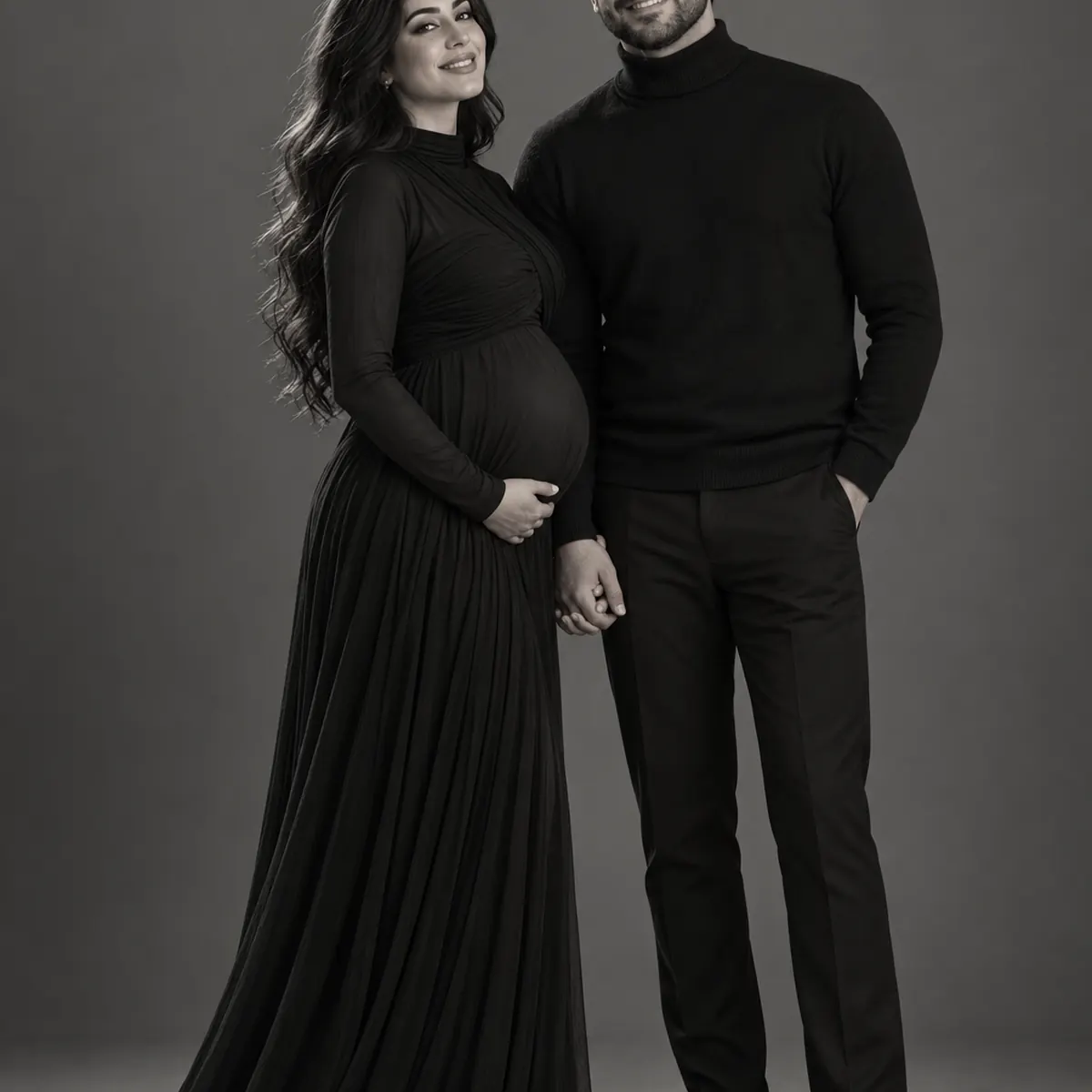 Black-and-white maternity couple portrait in a Markham studio