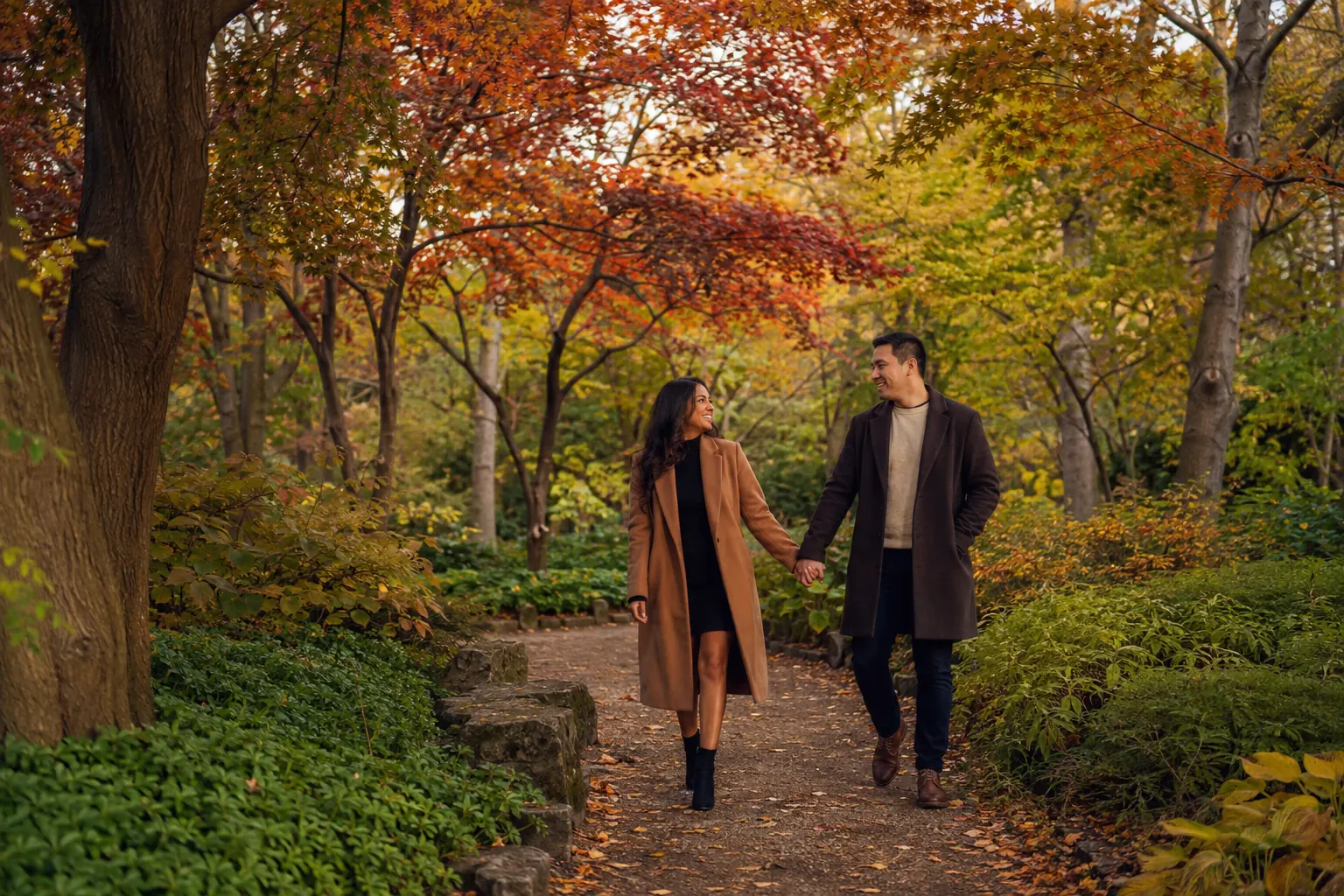 Fall engagement photography on a colourful path at Edwards Gardens Toronto
